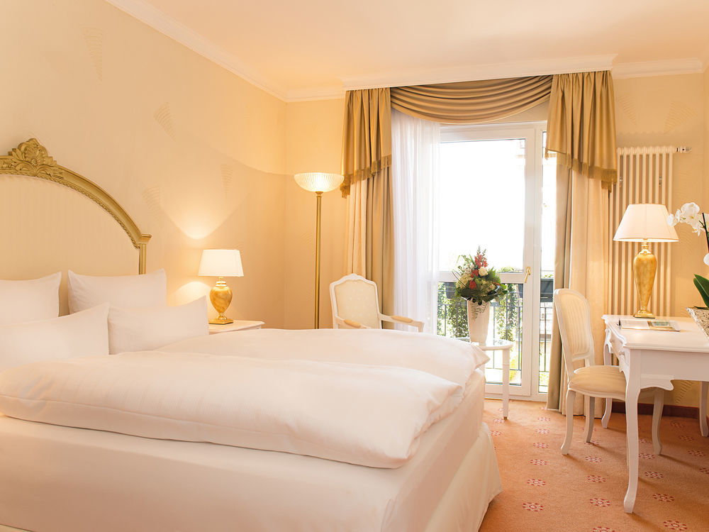 斯加罗斯伯格维克特雷迪斯酒店 嫩尼希 外观 照片 A typical room at the Hotel Axelmannstein